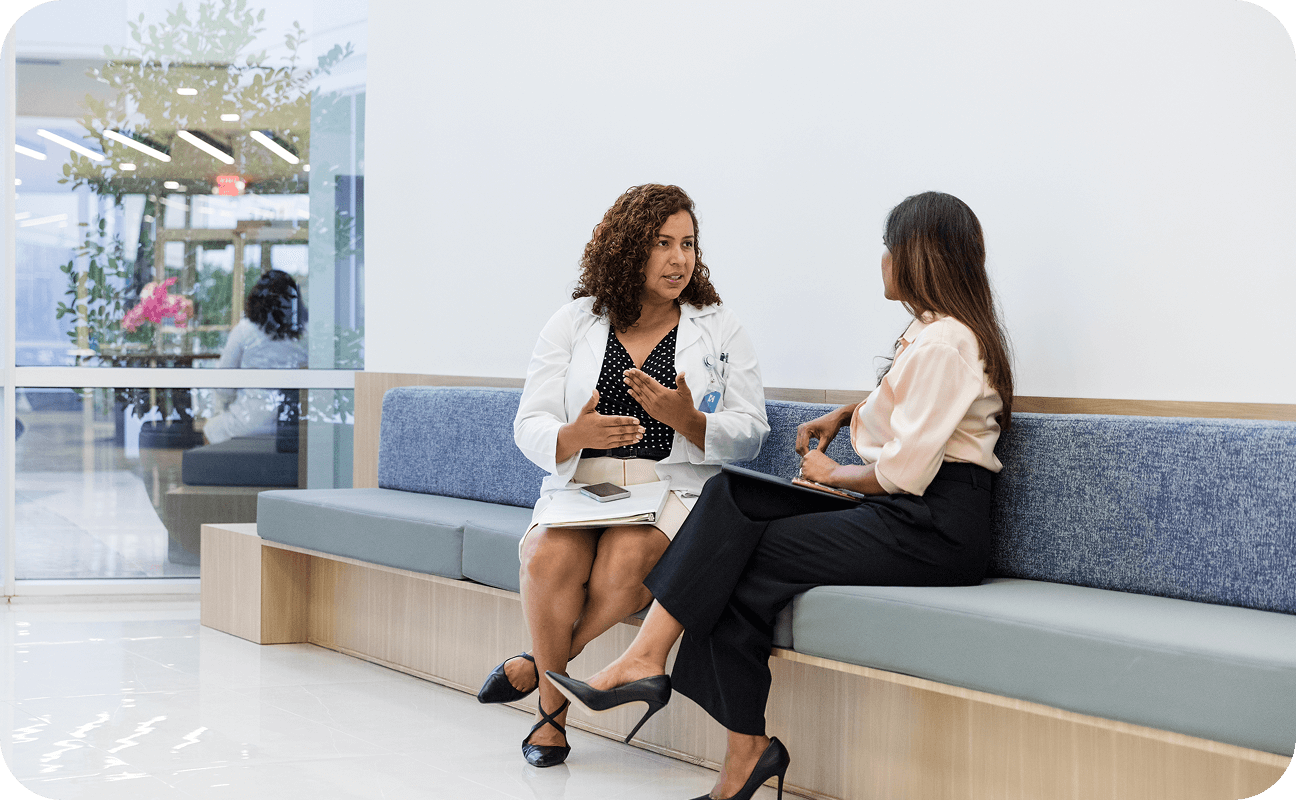 Image of two women talking